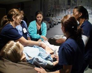 Residents performing simulation training at the FAU Schmidt College of Medicine Clinical Skills Simulation Center